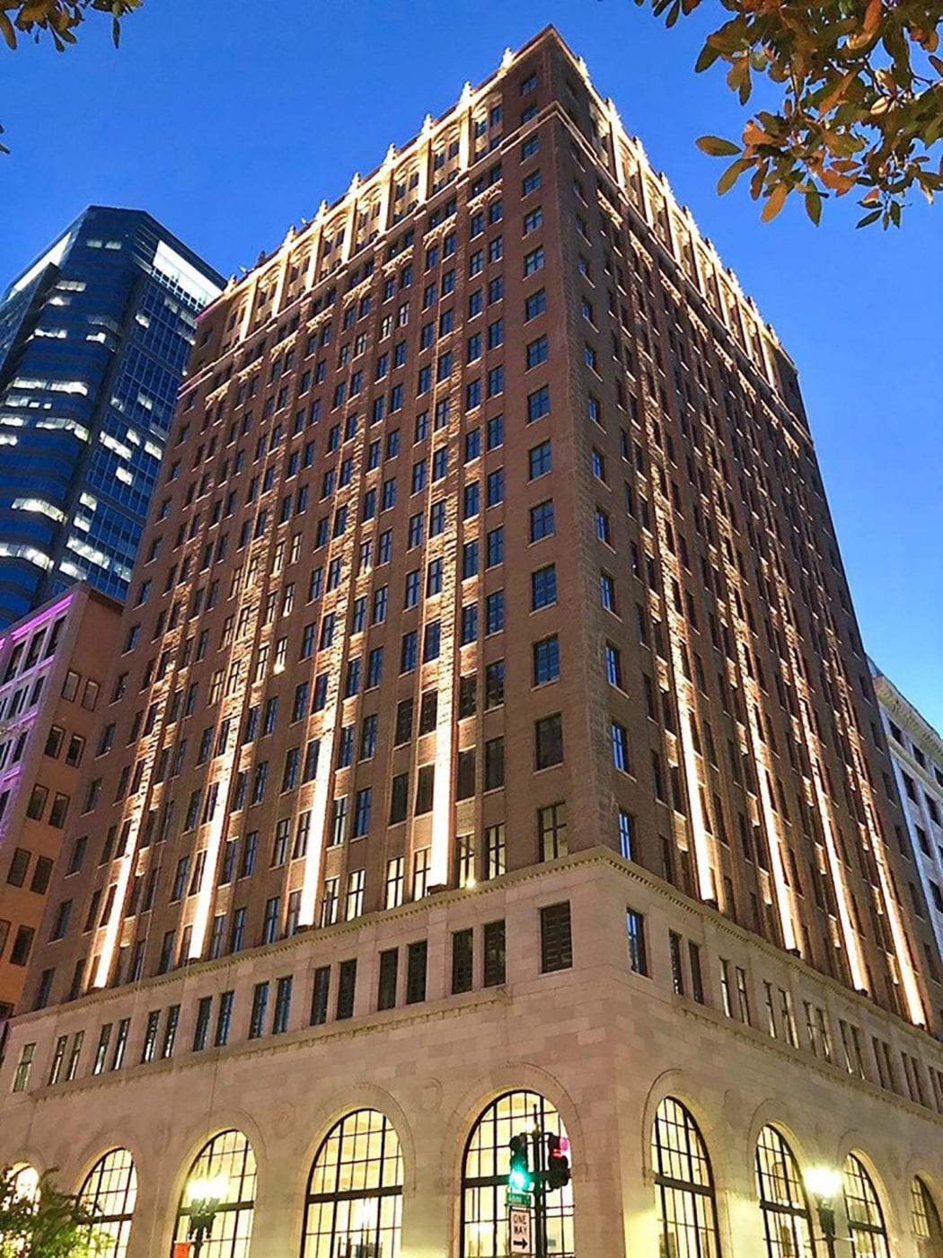 The Barnett Building in Jacksonville, Florida — a historic 18-story Art Deco landmark built in 1926, illuminated at dusk
